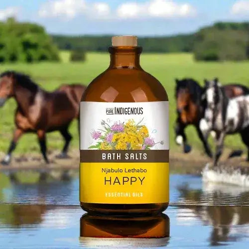 ZestySpiritz Happy Bath Salts 130g in a clear jar with colorful salts and a cheerful label on a wooden background.