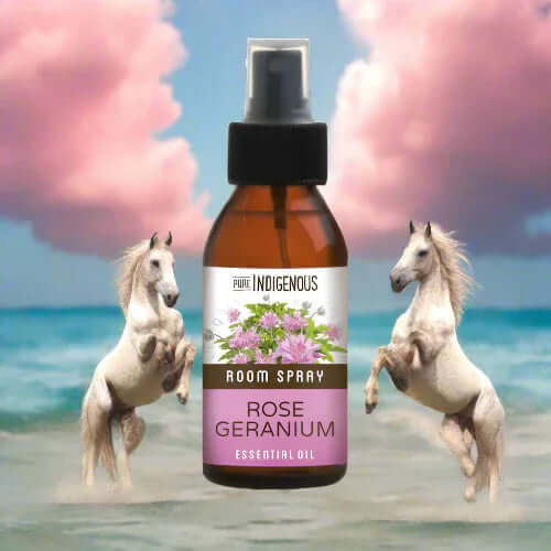 ZestySpiritz Rose Geranium Massage Oil 100ml bottle with a floral design and soothing oil texture on a wooden surface.
