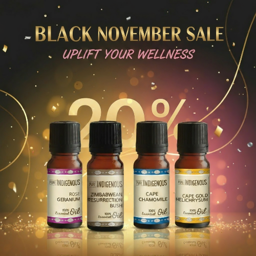 Four essential oil bottles with labels for an essential oil bundle for mood boosting on a festive background for Black November Sale.