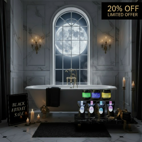 Luxurious bathroom setting with a bathtub, candles, and a window view of the moon.